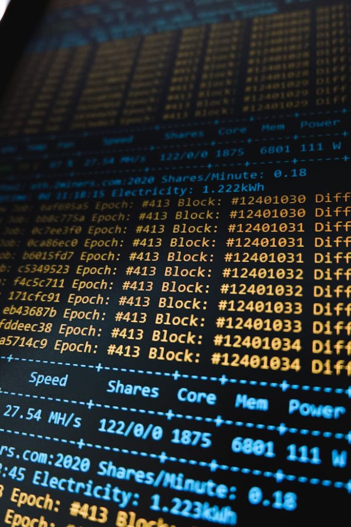 Detailed view of a cryptocurrency mining software interface displaying real-time data on a computer monitor.